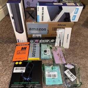 Tech bundle- headphone amplifier, speaker, phone cases, bluetooth adapter, etc